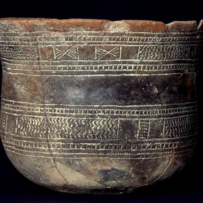 The Bell Beaker culture is named after its bell-shaped vessels such as this one from Kölsa, in the North Saxony district. It comes from the grave of a woman who was exceptionally old for the period, at 48 to 69 years of age (https://archaeo3d.de/sachsen/2019-04-24_fi_0002/) and, according to carbon-14 dating, was buried between 2402 and 2200 BC. Both bones in her lower forearm showed signs of a healed “nightstick” fracture that may have come from warding off a blow or a similar defensive action.