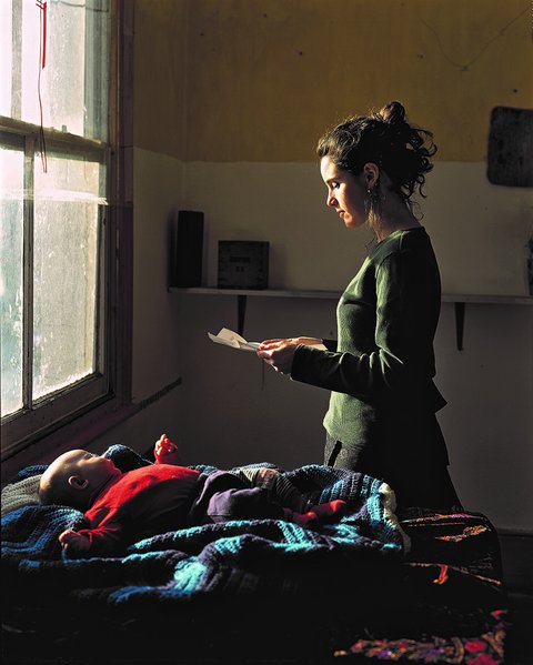 Tom Hunter, Woman reading a Possession Order, 1997.